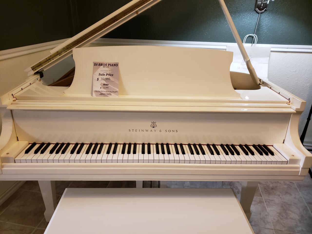 white baby grand piano steinway